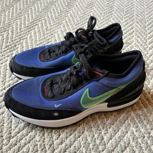 Excellent condition boys Nike sneakers. Size 4Y